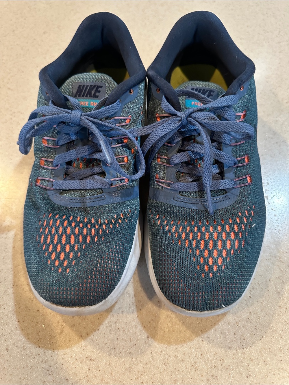 Nike free run blue with orange accents size 6
